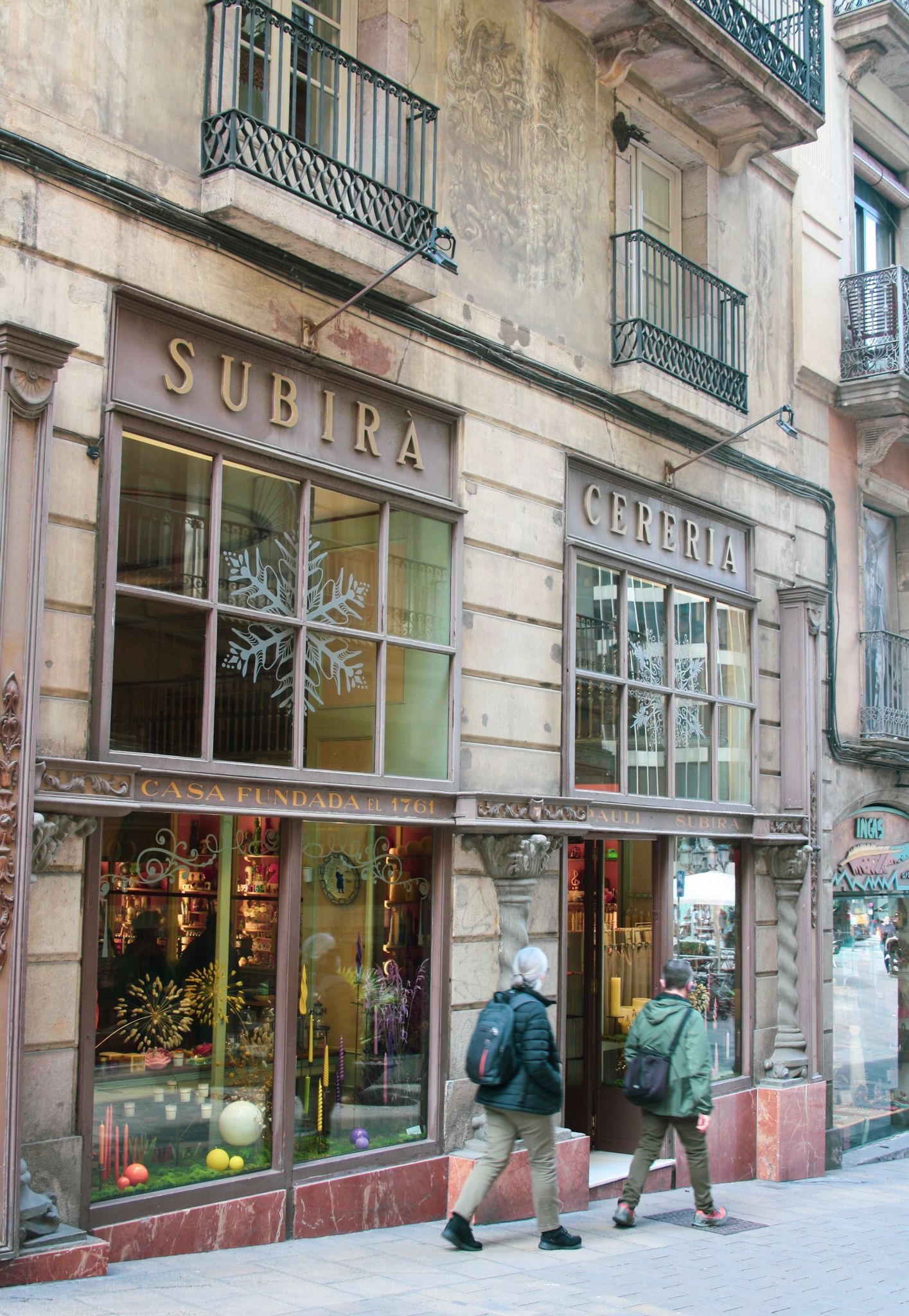 Facade of Cereria Subirà, Barcelona’s historic candle shop, with decorative storefront windows and traditional signage.